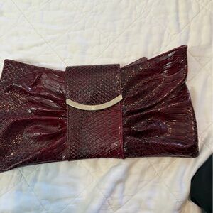 Express Maroon Snakeskin Clutch with Metallic Detail